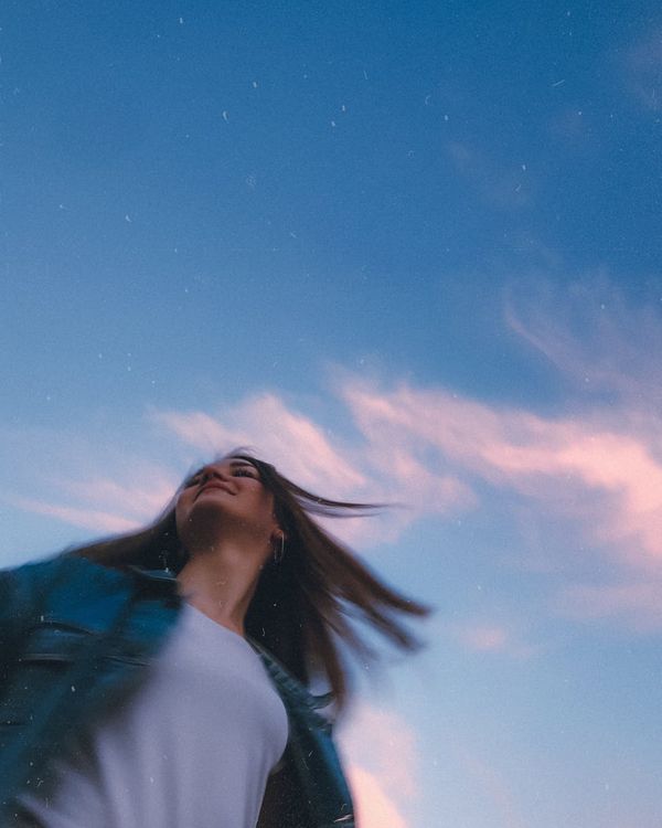 Woman feeling energetic and vibrant after a light workout session.
